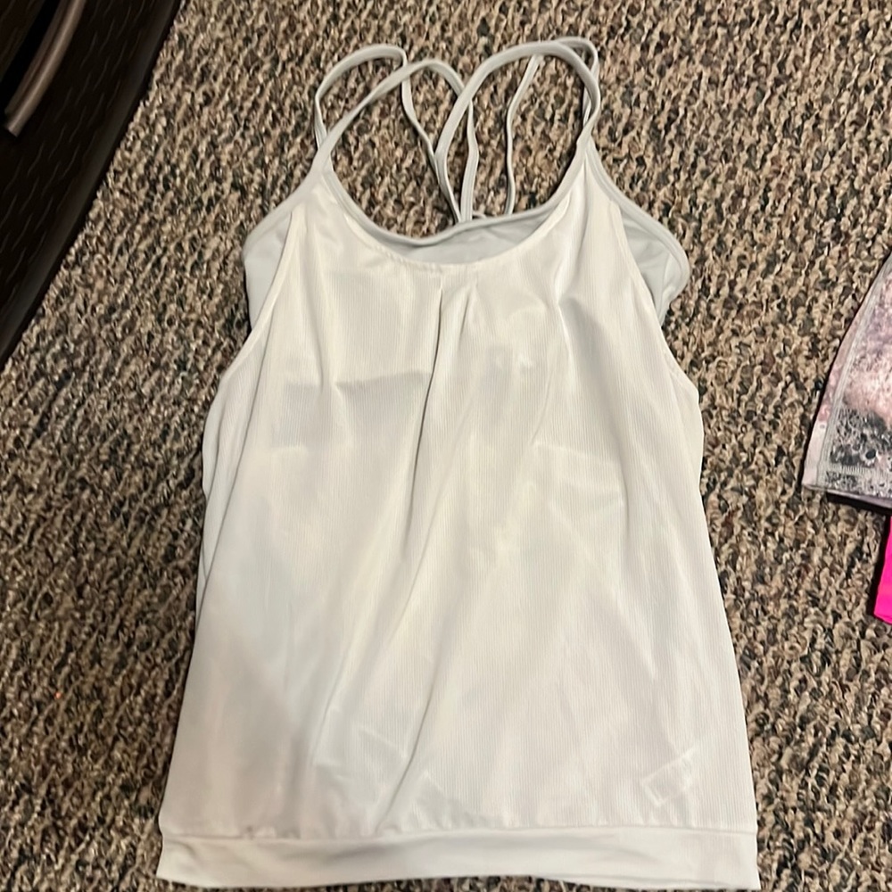 3 mint condition ALTHELTA workout tops